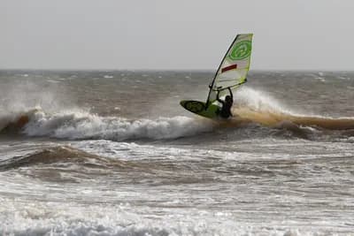 Windsurfer in the waves at Moulay Bouzerktoune